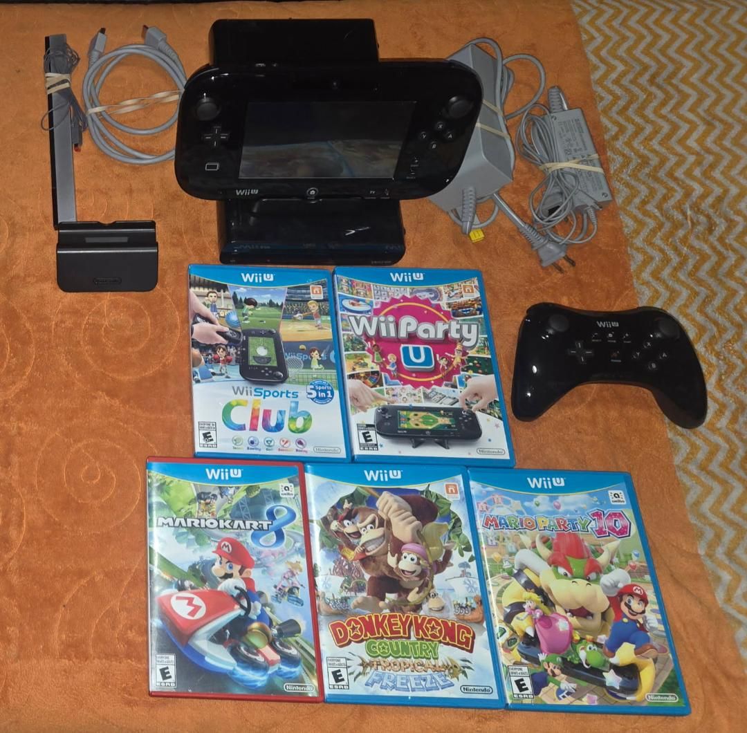 Nintendo Wii U deluxe with 7 games including Wii Party U! Trades considered!