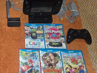 Nintendo Wii U deluxe with 7 games including Wii Party U! Trades considered!