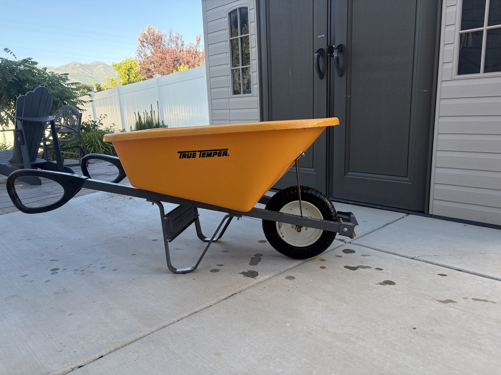 True Temper Single Wheel Wheelbarrow - Orange Poly Tray, Steel Frame, Ergonomic Handles