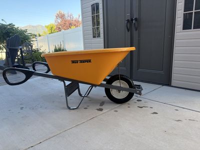 True Temper Single Wheel Wheelbarrow - Orange Poly Tray, Steel Frame, Ergonomic Handles