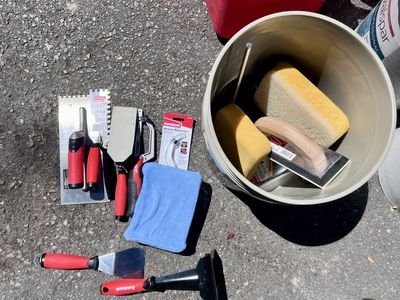 Bucket of tile tools ($20 OBO)