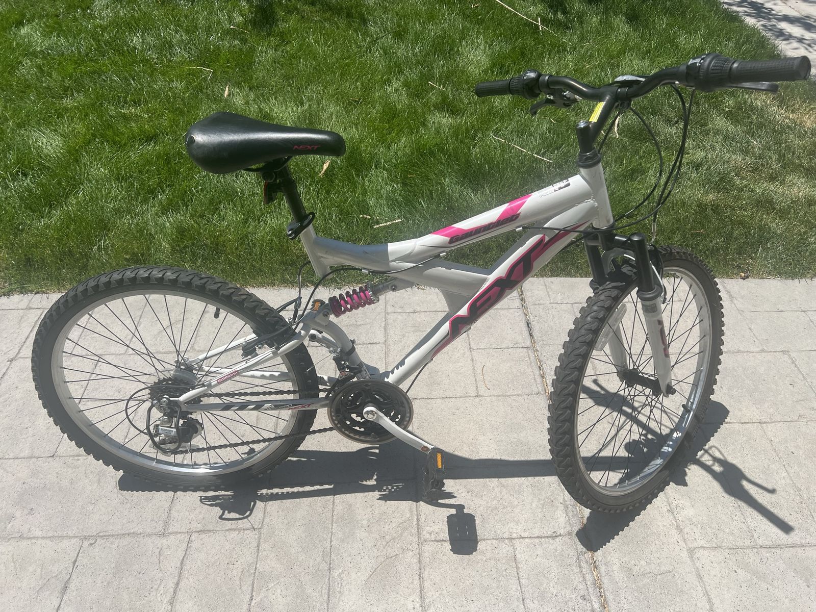 Next Pink & White Full Suspension Mountain Bike