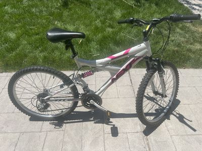 Next Pink & White Full Suspension Mountain Bike