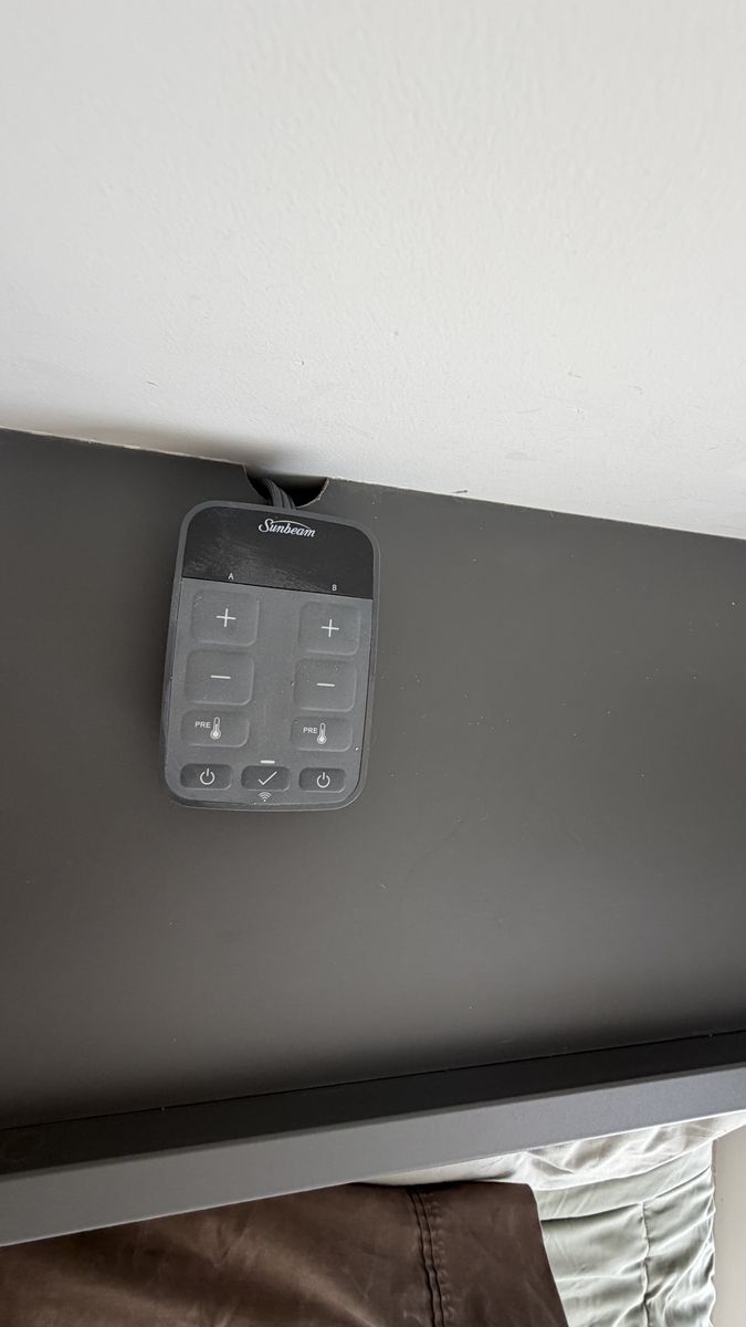 King-sized bed with WiFi connectable heater, sheets, and spread