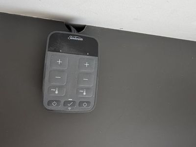 King-sized bed with WiFi connectable heater, sheets, and spread