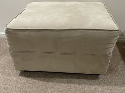 2 Beige Upholstered Ottoman with wheels