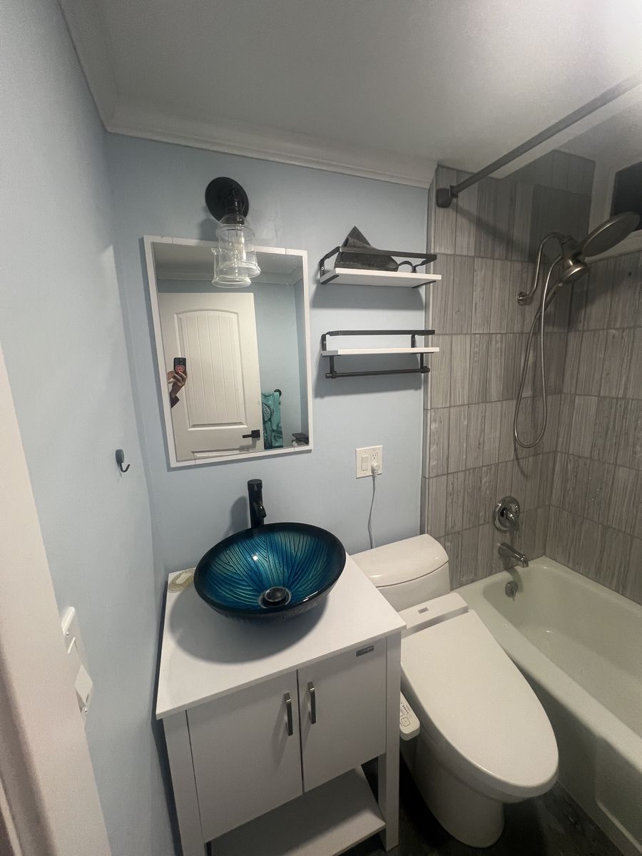 Bathroom vanity, sink, faucet, mirror, light and shelves