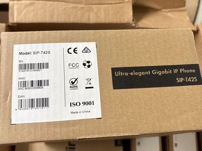 5 New Yealink SIP-T42S Gigabit IP Phones + 5 SurgeX XG-PCS-15D Surge Protectors – New in Box