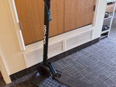 GOTRAX Rival Electric Scooter - Black with Digital Display and Headlight, Charger, and Plastic Parking Mud Pad
