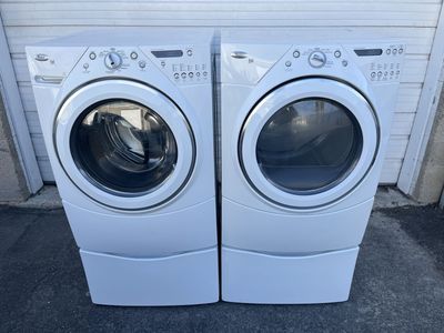 Whirlpool electric set on pedestals,free delivery