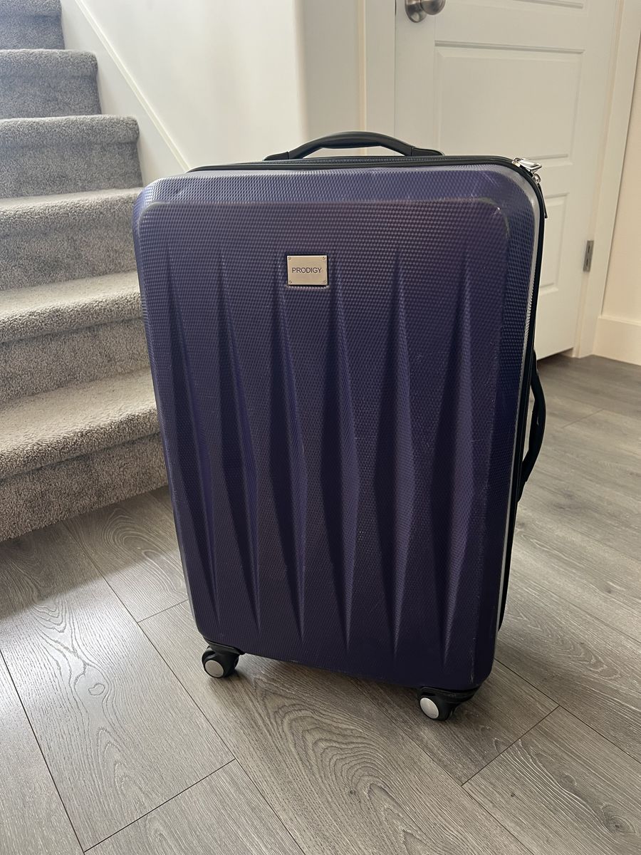 Prodigy Hardshell Spinner Checked Luggage Suitcase