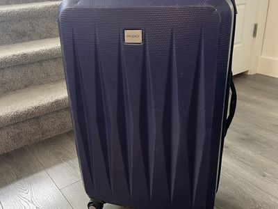 Prodigy Hardshell Spinner Checked Luggage Suitcase