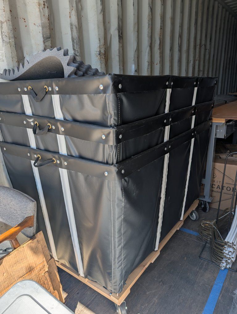Uline H-2099BL 24 Bushel Black Vinyl Basket Truck Heavy Duty w/ 4" Swivel Casters