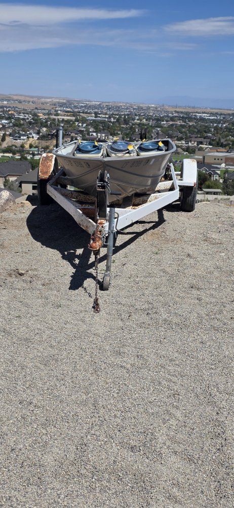14 ft aluminum boat with 9.8 hp motor.