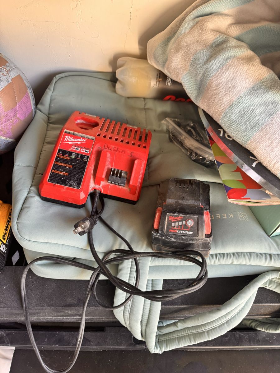 Milwaukee M12/M18 Multi-Voltage Battery Charger and M18 RedLithium Battery