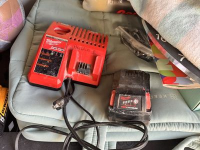 Milwaukee M12/M18 Multi-Voltage Battery Charger and M18 RedLithium Battery