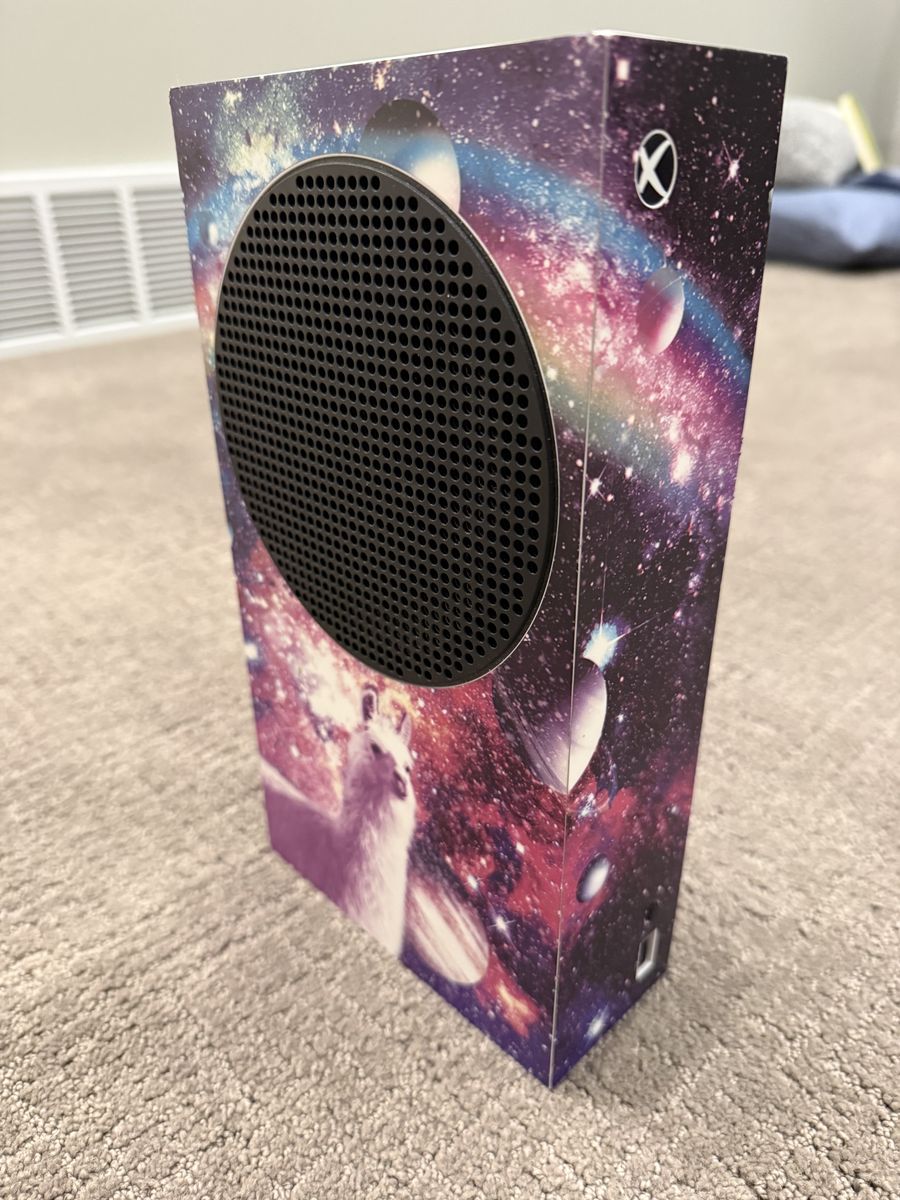 Xbox with cool wrap and monitor, two controllers, mic, controller charging station