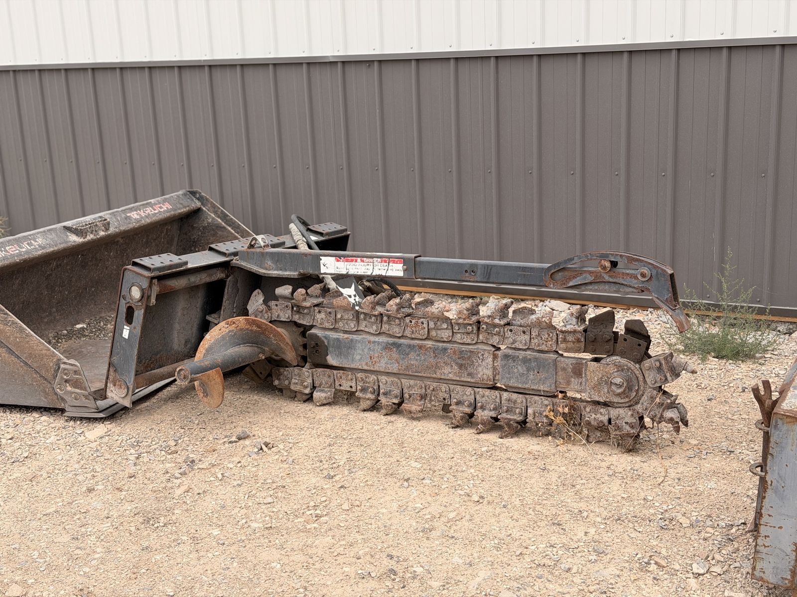 Skid steer trencher attachment
