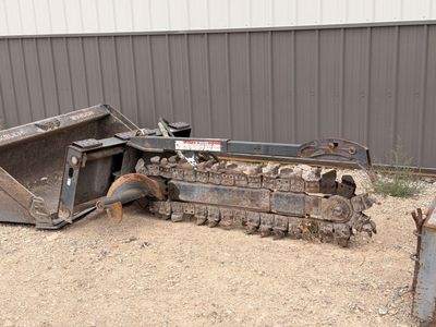 Skid steer trencher attachment