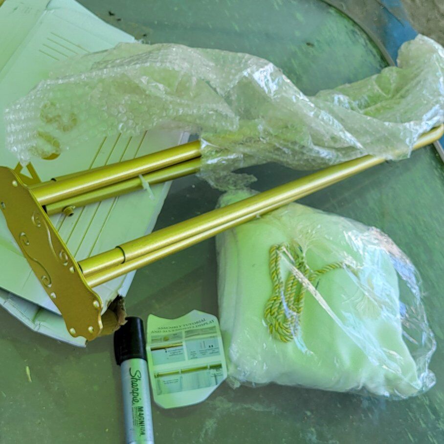 white curtain with gold double rods