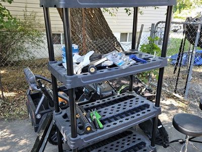 Black 4-Tier Plastic Storage Shelf Unit - Durable & Versatile Garage/Utility Organizer