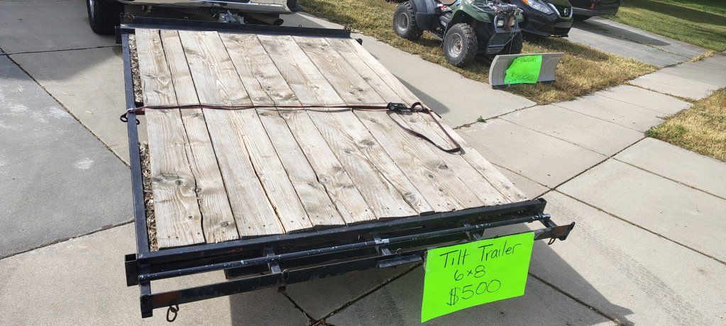 Tilt deck trailer