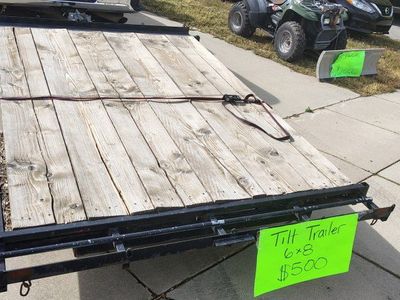 Tilt deck trailer