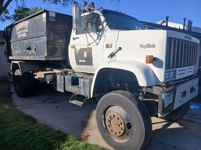 GMC TopKick C7, AWD, Roll-Off Dumpster Truck.