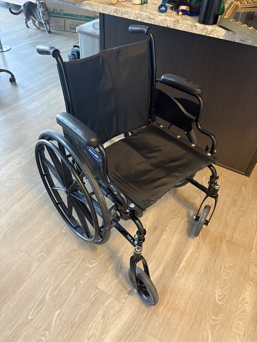 Folding push wheelchair