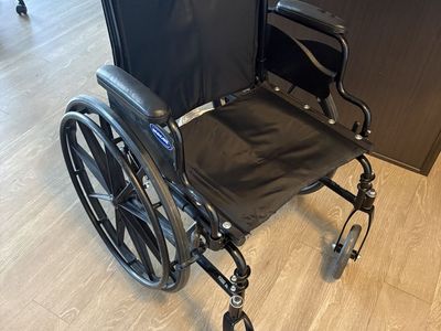 Folding push wheelchair