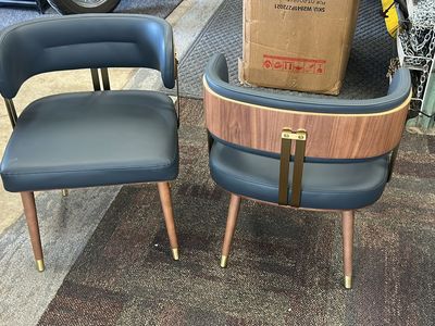 Set of 2 Modern Dining Chairs - Gray Faux Leather, Wood Back & Gold Accents