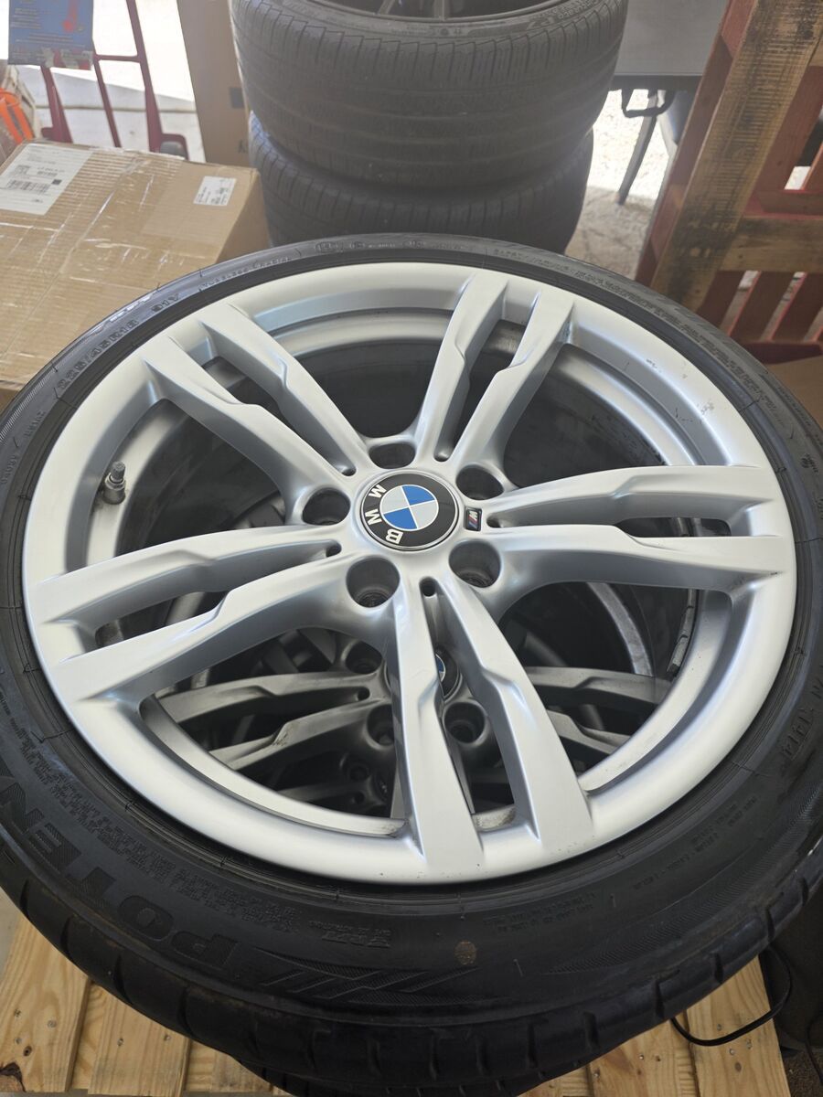 Genuine BMW Style 441 M Sport alloy wheels and tire package.