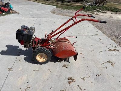 Troy-Bilt rear tine rototiller, 8HP Briggs & Stratton engine.