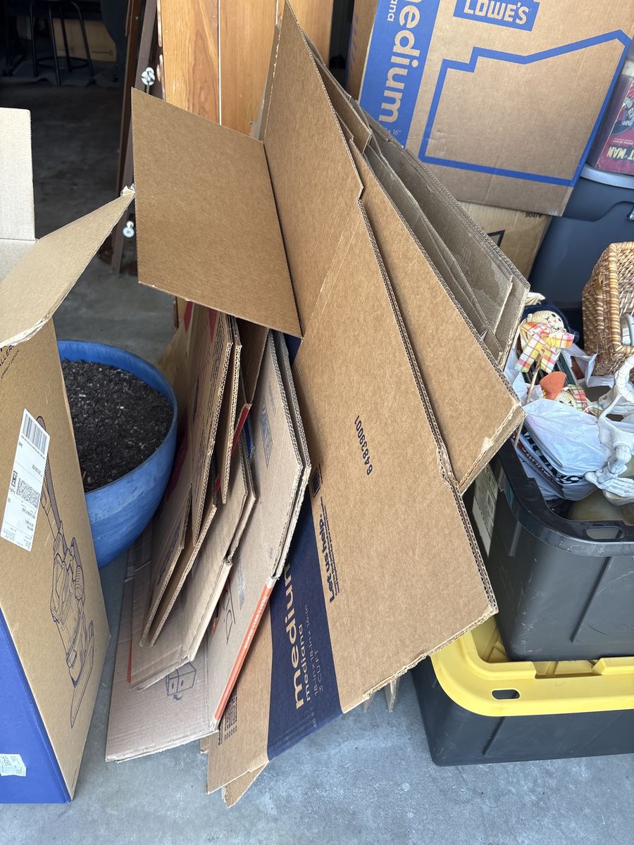 35 moving boxes and plastic totes