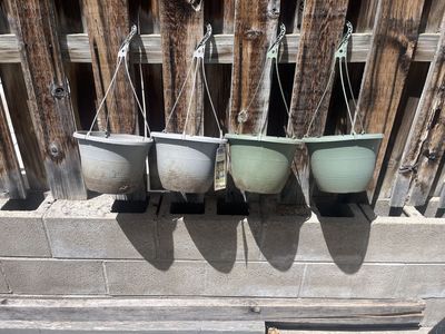 Free hanging plant containers
