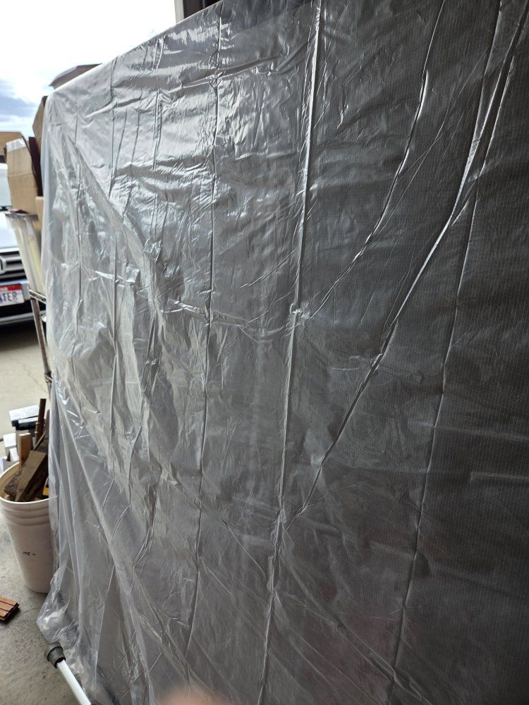 Queen box spring under top mattress.