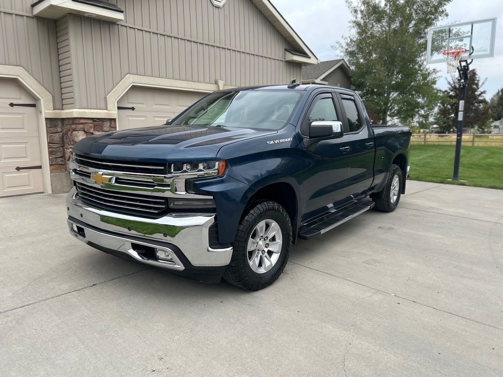 2019 Chevrolet Silverado 1500 — rebuilt & branded title, 14% below market