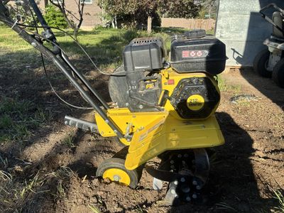 Champion front tine tiller.