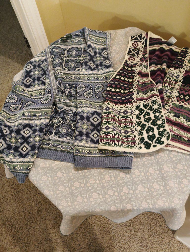 Two medium size vests