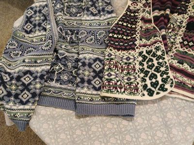 Two medium size vests