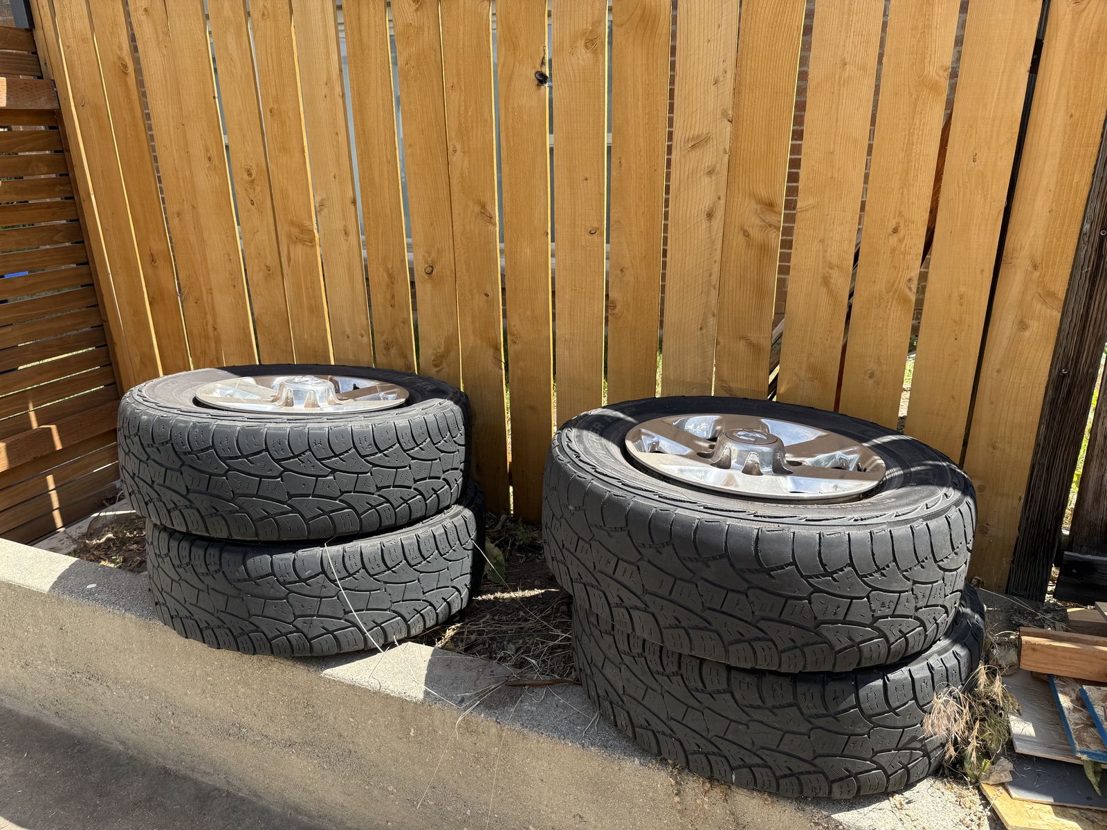 4 RAM 2500 tires and rims. LT275/70R18
