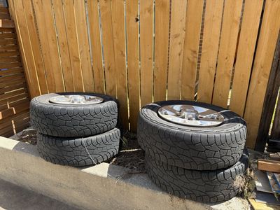 4 RAM 2500 tires and rims. LT275/70R18