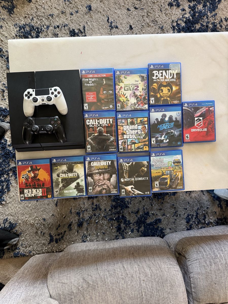 Sony PlayStation 4 (PS4) Console with 2 Controllers & 12Games - Red Dead Redemption 2 CoD, GTA V 500GB