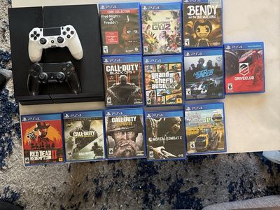 Sony PlayStation 4 (PS4) Console with 2 Controllers & 12Games - Red Dead Redemption 2 CoD, GTA V 500GB