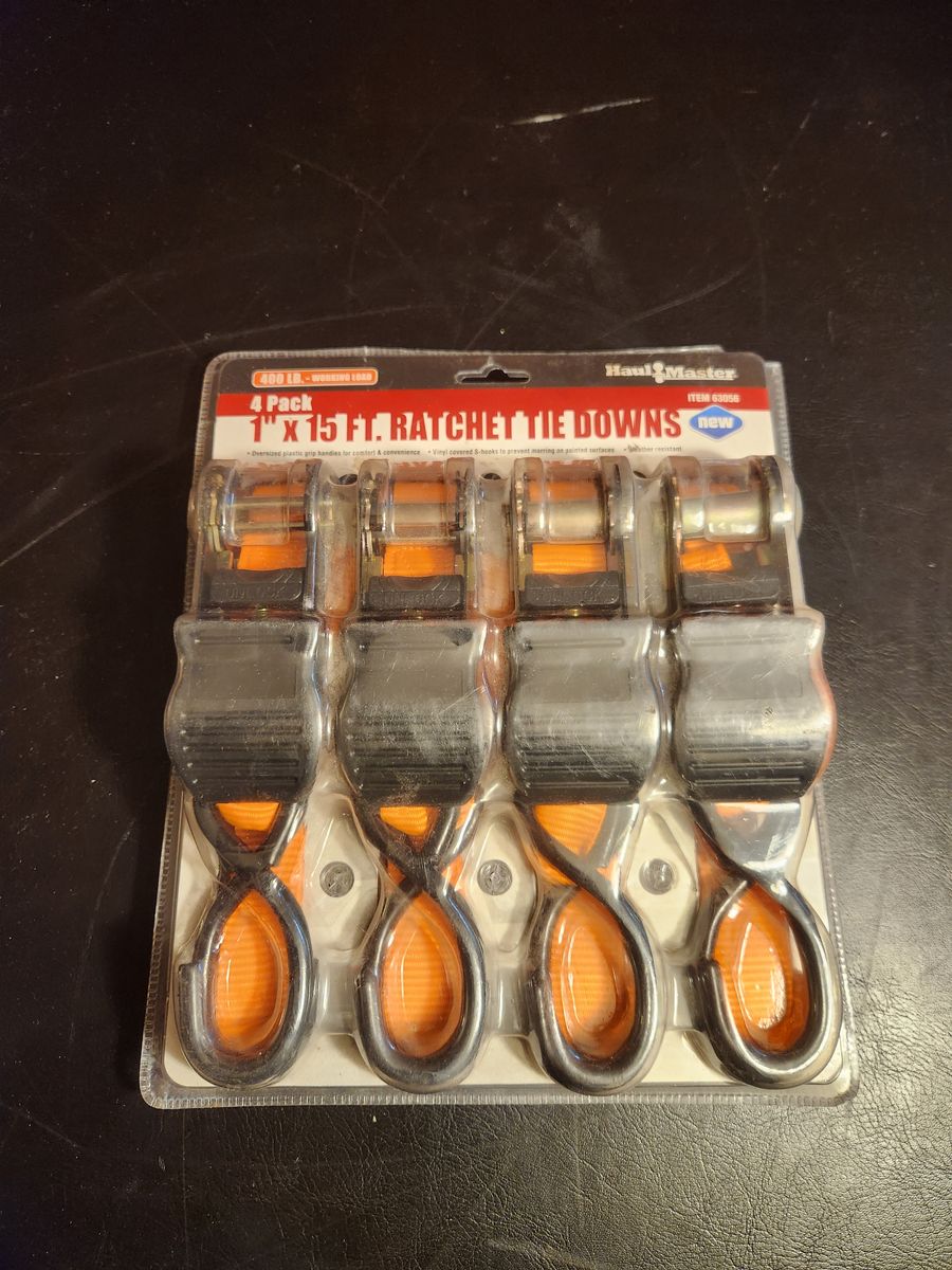 Five ratcheting tie down straps.  400 pound strength.  All brand new.