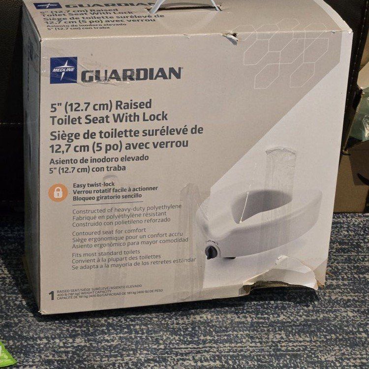 Raised toilet seat