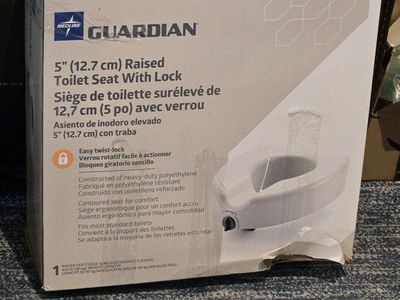 Raised toilet seat