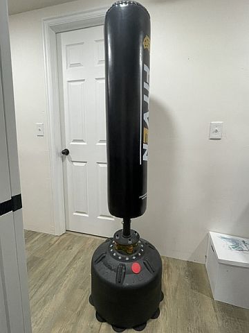 Fitven 70" freestanding punching bag - home use - boxing, kickboxing, and full-body workouts.