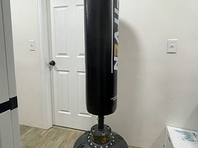 Fitven 70" freestanding punching bag - home use - boxing, kickboxing, and full-body workouts.