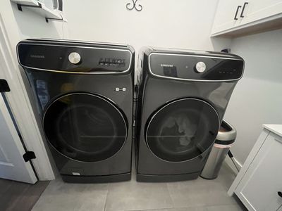 Samsung Front Load Washer and Dryer Set Black Stainless Steel